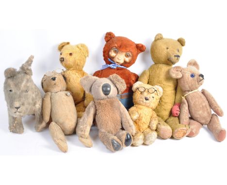 A collection of x8 antique / vintage teddy bears, by various makers, to include; a large 15" musical teddy bear (possibly by 