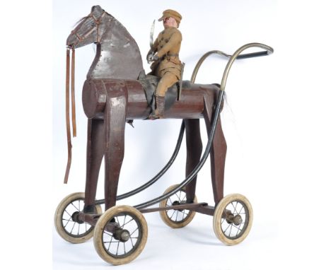 A charming and poignant original WWI First World War hand-made ' Tommy ' rocking horse. The horse of wooden construction with