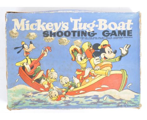 A rare original 1950's Chad Valley made Walt Disney ' Mickey's Tug-boat Shooting Game '. Appears complete with all four chara