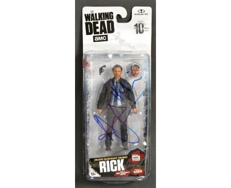 Andrew Lincoln - English Actor - rare McFarlane Toys made ' The Walking Dead ' action figure of Rick Grimes. Signed to the fr