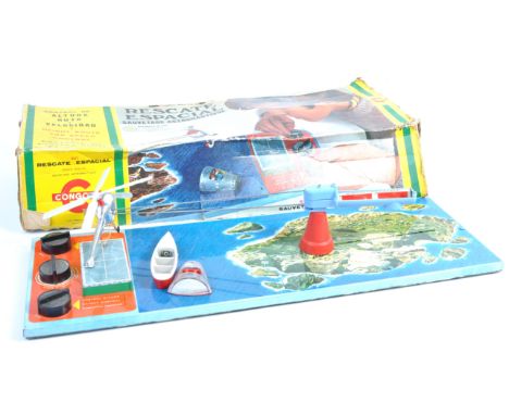 A rare vintage Congost made Spanish ' Space Rescue ' tinplate game. The tinplate playing board with plastic Apollo capsule, b