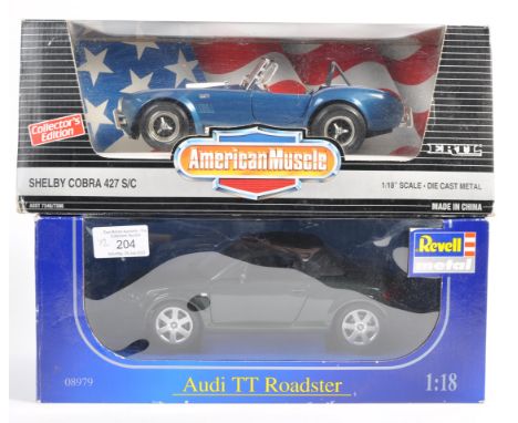 Two original 1/8 scale precision diecast models comprising; Revell Audi TT Roadster and Ertl 'American Muscle' Shelby Cobra 4