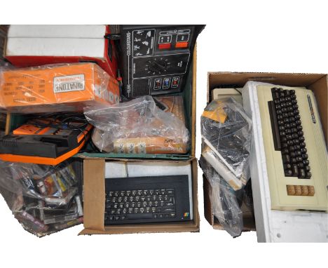 A good large collection of assorted vintage computer games consoles / computer consoles, to include; a Commodore Vic 20, a Vi