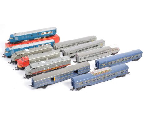 A collection of original Triang made 00 gauge model railway train set locomotive sets comprising a Blue Pullman Engine &amp; 