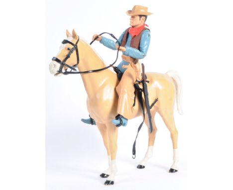 An original vintage Marx Toys made Johnny West cowboy action figure and Thunderbolt horse. Lots of accessories present includ