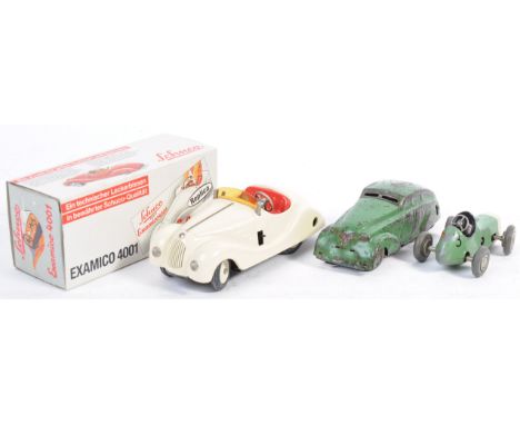 A collection of 3x clockwork tinplate model toy cars comprising a Schuco 1041 Micro Racer, Replica Schuco 4001 in original bo