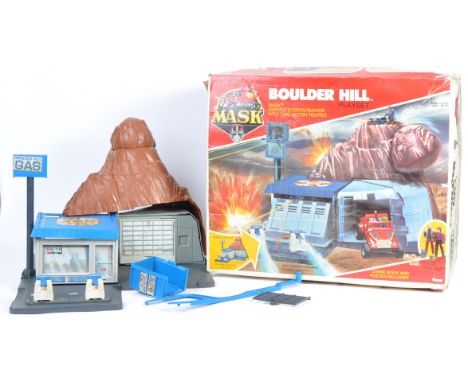 A rare original vintage Kenner made MASK ' Boulder Hill ' action figure playset. Appears largely complete (just missing two g