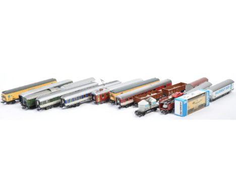 A collection of approx 20x Marklin made H0 scale model railway train set carriages / coaches and rolling stock comprising DB,
