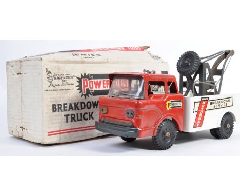 An original vintage Marx Toys made Powerhouse series Breakdown Truck tinplate model. Complete with tow cable and hook. Some m