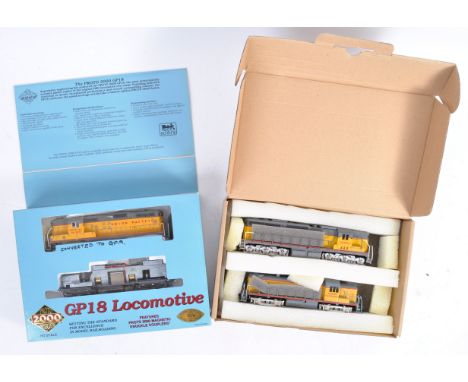 Two Life-Like Trains made ' Proto 2000 Series ' HO gauge scale model railway trainset locomotive sets. The first being a GP18