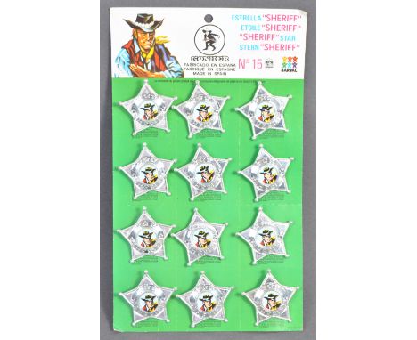 A charming vintage c1950's Gonher made ' Sheriff Star ' in-store toy shop countertop display card. Featuring x12 original unu