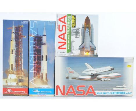 A collection of x46 Dragon Wings made NASA Space Collection 1/400 precision scale diecast model rockets and shuttles. Compris