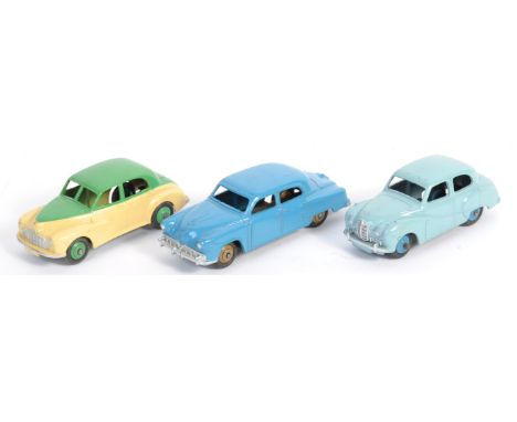 A collection of 3x original vintage Dinky Toys made diecast models comprising: 161 Austin Somerset in light blue, 172 Studeba