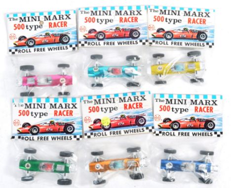 A collection of x6 Marx Toys made ' Mini Marx ' diecast 500 type Racer&nbsp;cars with roll free wheels. Factory sealed and un