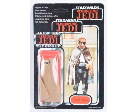 An original vintage 1983 Kenner made Star Wars carded MOC action figure ' Prune Face '. Factory sealed upon its original unpu
