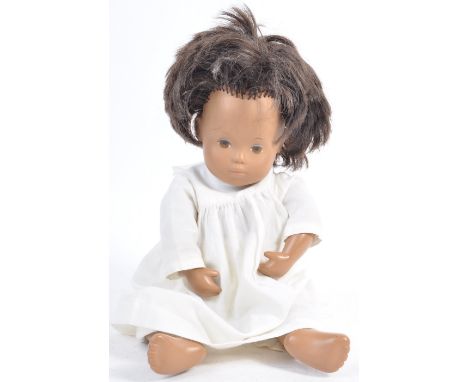 A rare original vintage 1970's vinyl Sasha Doll ' Baby Trendon '. With original clothing. Hand painted eyes and lips, with co