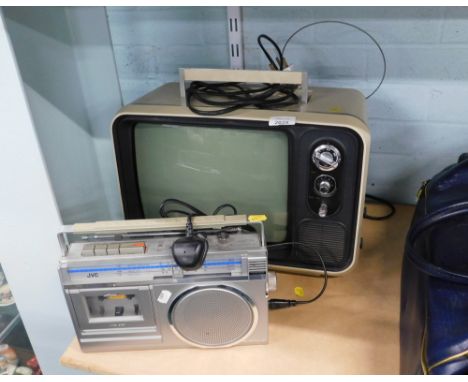 A Solid State vintage television, together with a JVC cassette player.&nbsp;
WARNING! This lot contains untested or unsafe el
