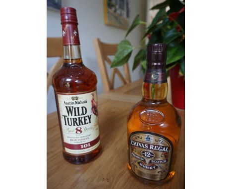 Two bottles of whisky - Chivas Regal 12 year old blended Scotch whisky and Austin Nichols Wild Turkey 8 year old Kentucky Str