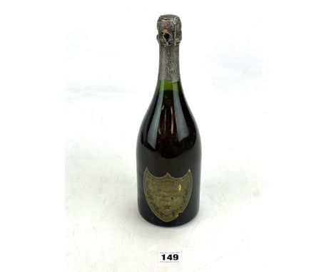 Bottle of Moet et Chandon champagne, cuvee Dom Perignon vintage 19?? (unreadable)