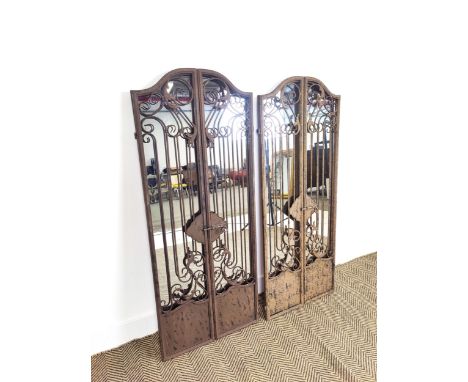 ARCHITECTURAL WALL MIRRORS, a pair, with metal gated frames, 130cm H x 51cm. (2)
