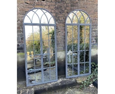 ARCHITECTURAL GARDEN MIRRORS, a set of three, gated arched metal frames, 180cm H x 75cm. (3)