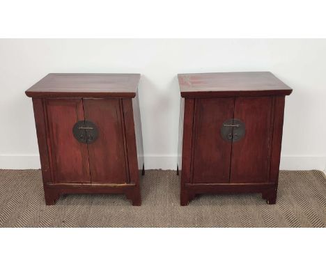 SIDE CABINETS, a pair, Chinese lacquered, each with two doors enclosing a drawer and shelf, 75cm H x 60cm W x 40cm D. (2)