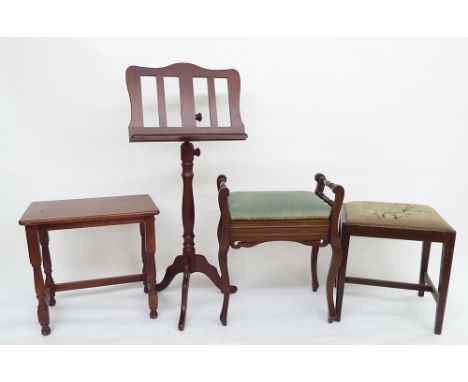 Edwardian walnut box piano stool; together with two mahogany music stools and a contemporary height-adjustable tripod music s