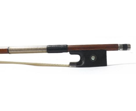 Silver mounted violin bow stamped Vitali***, the stick octagonal, the ebony frog inlaid with silver rings enclosing pearl eye