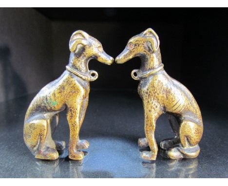 Sold of behalf of the RNLI - Bronze pair of lurcher dogs stamped to back. 