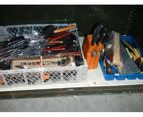 A quantity of cutlery etc. (1 shelf)