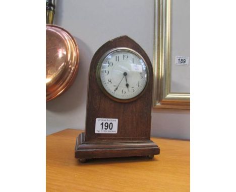 An Edwardian inlaid steeple mantel clock