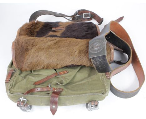 German WW2 army belt with fur back pack complete with straps.
