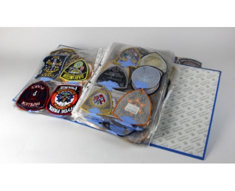 United States Police cloth patch collection housed in two large folders  (approx 300)