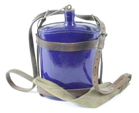 Great War British Army Water bottle. Blue enamel body with captive cork stopper. Leather carrier (cavalry?) with leather carr