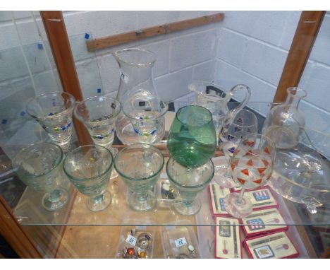 Shelf of mixed glassware