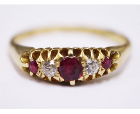 An 18ct gold diamond ruby ring, gross wt. 3.9g, size S