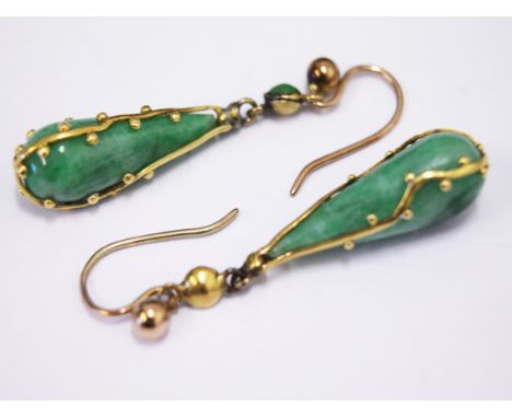 A pair of yellow metal mounted jade drop earrings, gross wt. 5.2g