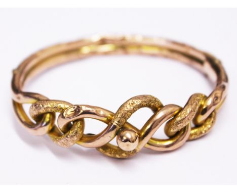 A Victorian/Edwardian 9ct gold bangle, diam. 7cm, wt. 14.3g