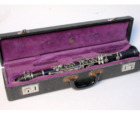 A Boosey & Hawkes nickel plated clarinet numbered 35306 & 469 with box. Condition - appears in good condition but sold as see