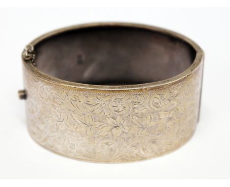 A hallmarked silver bangle, length 7cm