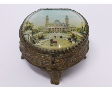 A gilt metal souvenir trinket box, diam. 7.5cm. Condition - good, no damage, general wear.