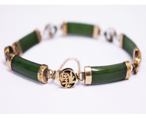 A Chinese 18ct gold jade bracelet, length 16cm, gross wt. 13g