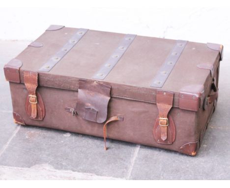 A vintage leather bound trunk. L93cm