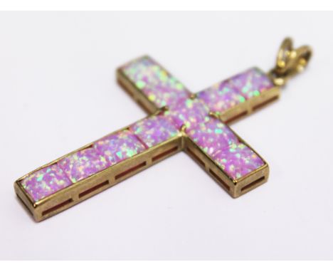 A 9ct gold and opal crucifix pendant, length 5cm, gross wt. 4g