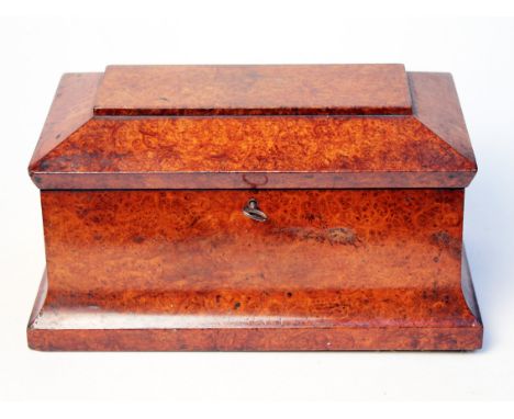 A 19th Century amboyna tea caddy. L33cm