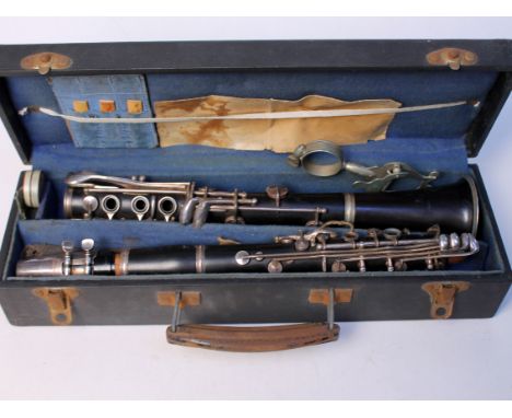 A Boosey & Hawkes nickel plated clarinet numbered 37988 with box. Condition - appears in good order but sold as seen.