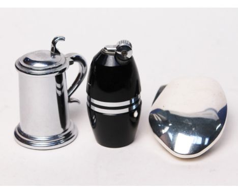 Three vintage table lighters comprising a Dunhill tankard, a Poppell grenade and a Flaminaire