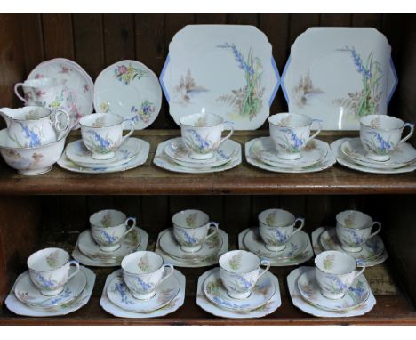 A Shelley Bluebell pattern 40 piece tea set, together with three Shelley Bridal Rose cups and saucers. Condition - blue bell 