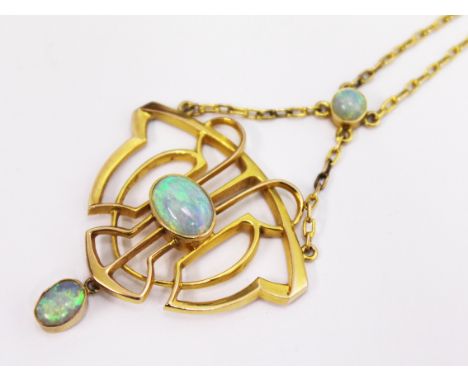 A yellow metal Art Nouveau opal pendant, length 4.8cm, on chain, gross wt. 5.7g