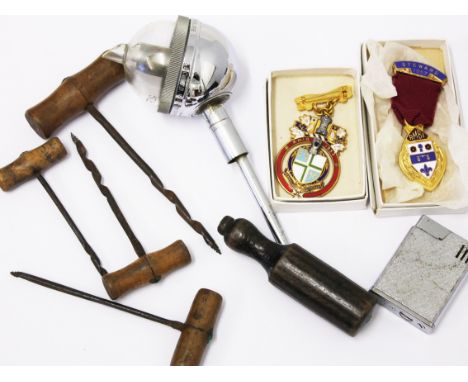 A mixed lot comprising two Masonic medals, four corkscrews, a pourer and a lighter